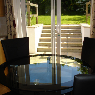 Dining area with terrace doors to back garden.