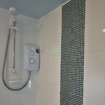 Electric Shower (over bath) - unlimited hot water