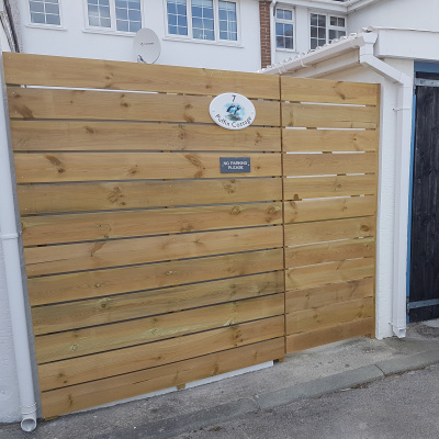 Rear Fence and gate with parking areas